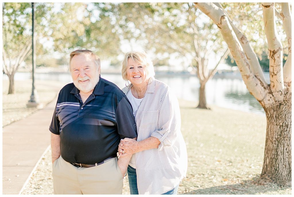 Morrison Ranch Couples Photos with green grass, lake, and tress