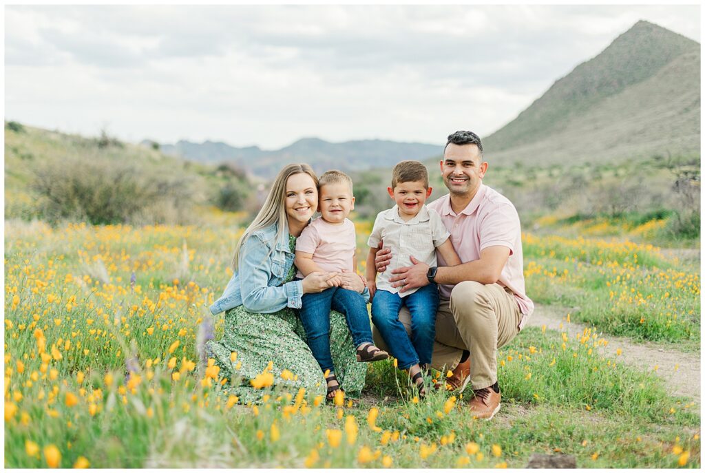 Full family kneeling in a field of Spring Desert Wildflower Family Photos | Bethie Grondin Photography