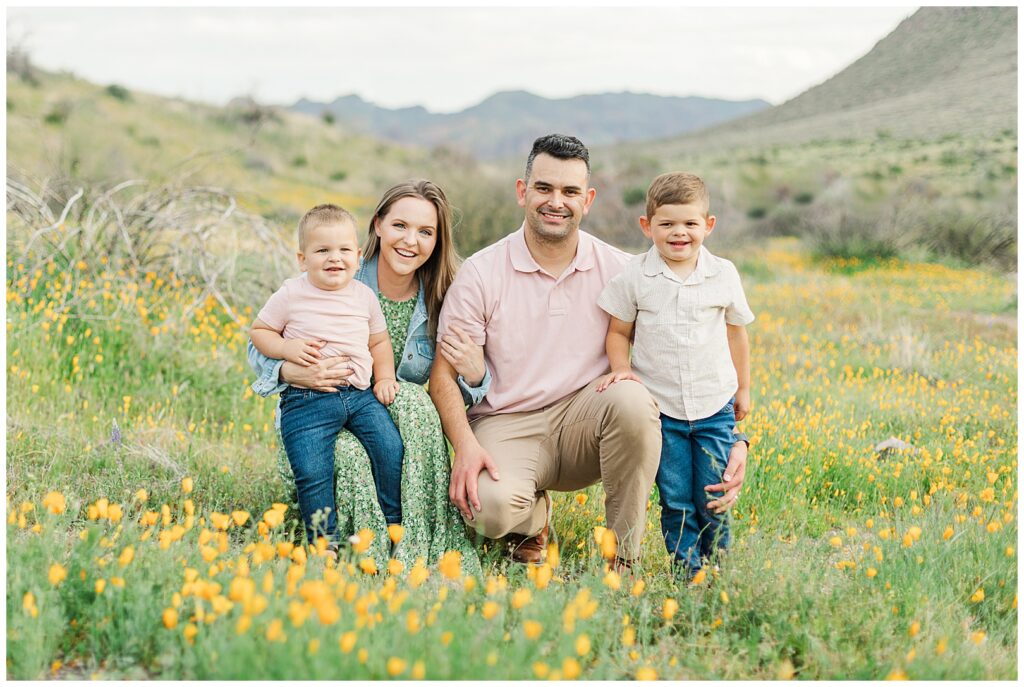 Full family kneeling in a field of Spring Desert Wildflower Family Photos | Bethie Grondin Photography