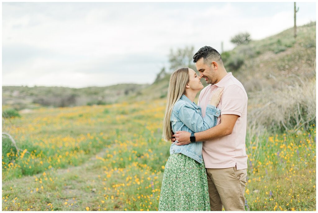 Husband and wife portraits standing in a field of wildflowers at bush highway spring desert photos 