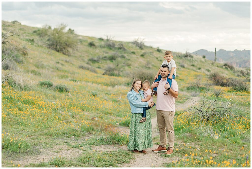 Full family standing in a field of Spring Desert Wildflower Family Photos | Bethie Grondin Photography