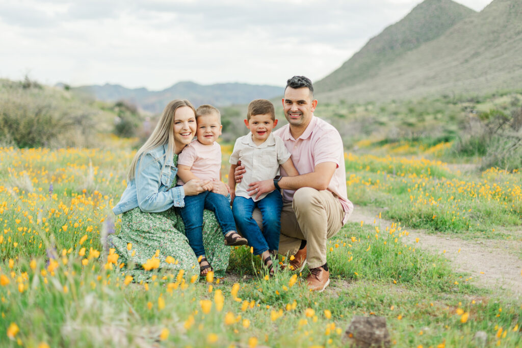 Full family kneeling in a field of Spring Desert Wildflower Family Photos | Bethie Grondin Photography