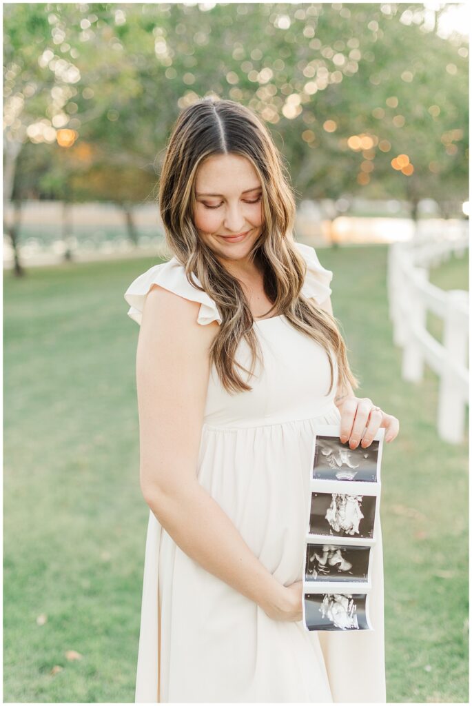 mama holding her bump and ultra sound