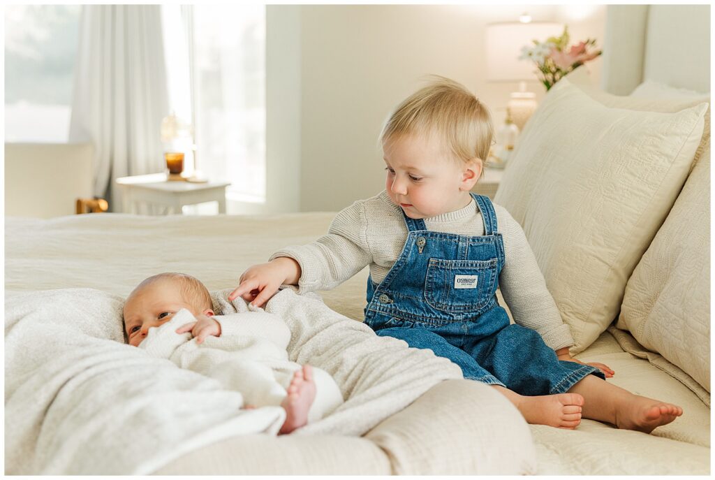 toddler meeting her newborn little brother | Gilbert, Arizona In-home Newborn Session