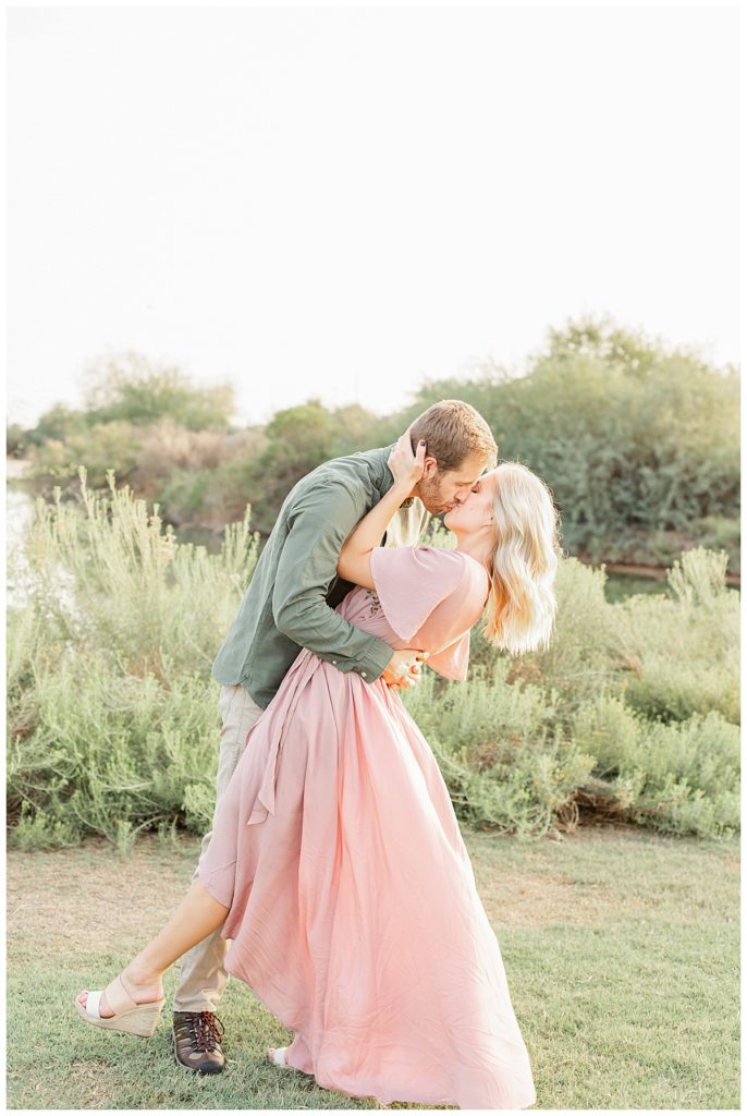 Couples photos at Riparian Preserve, woman wearing long pink, flow dress, recipes for styling your engagement session