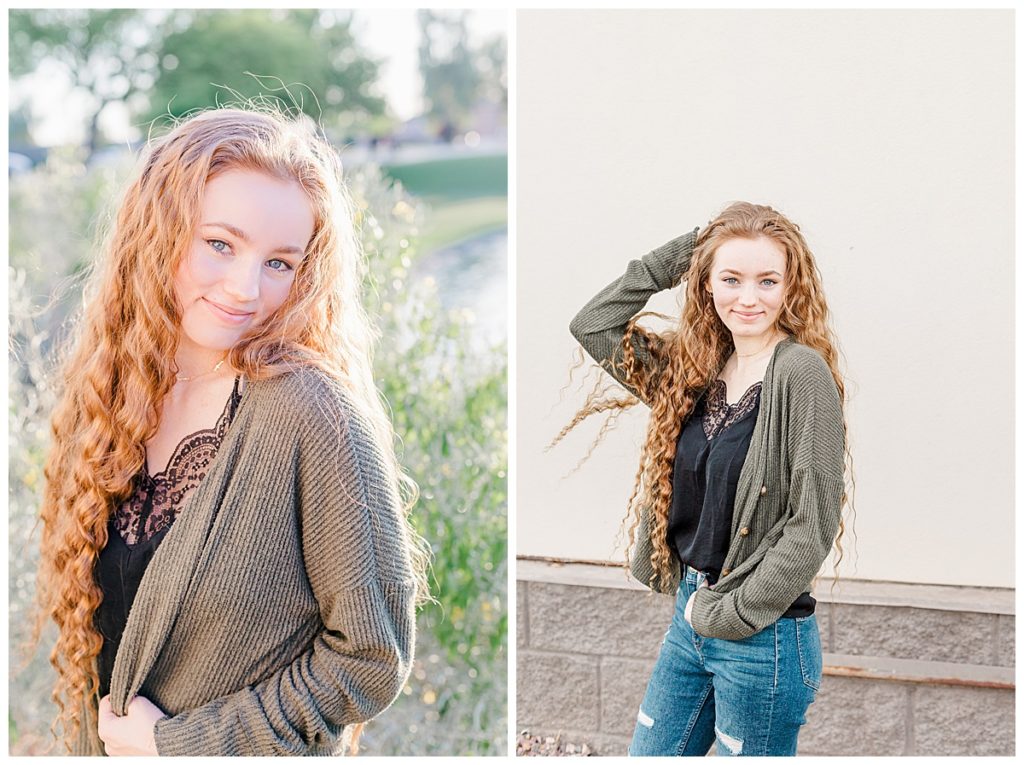 Addi's senior photos, Girl smiling softly directly toward camera, standing in front of greenery and white wall at Layton Lakes