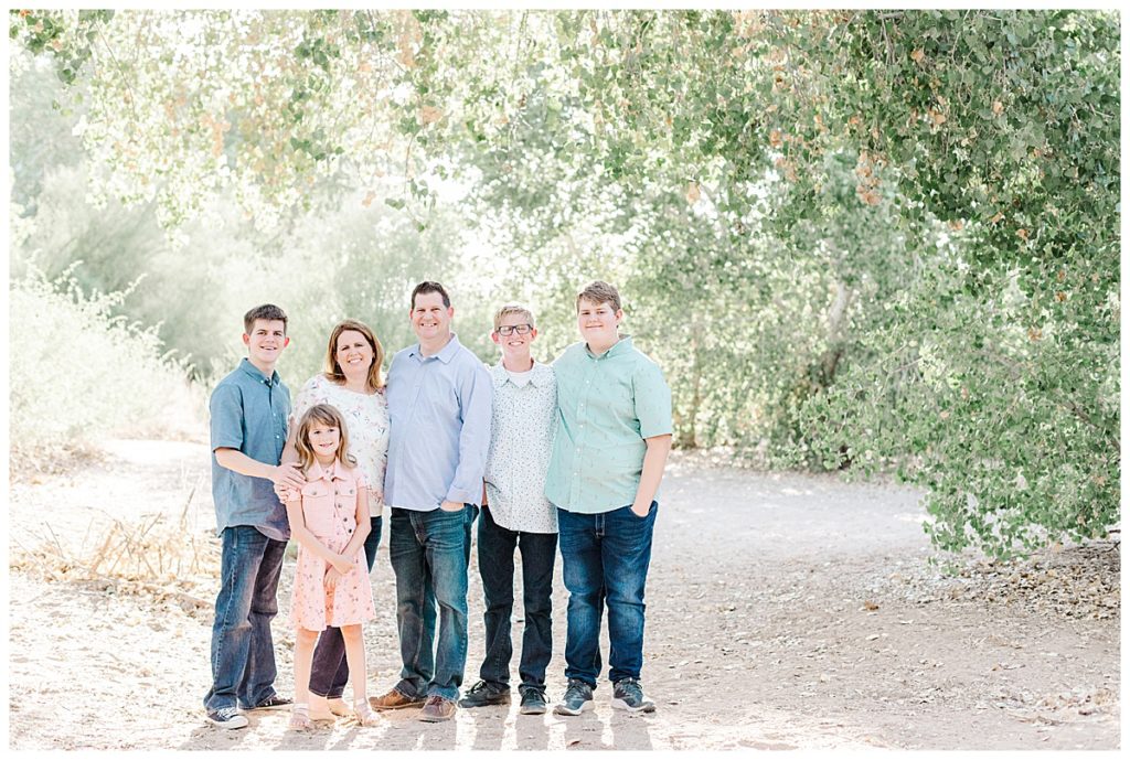 Ison's family photos, Family standing under big green trees in Queen Creek Wash