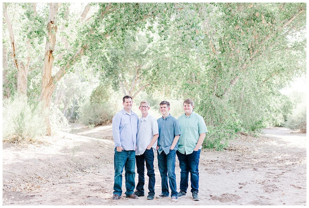 the Ison's family photos, dad standing next to his 3 boys at queen creek wash