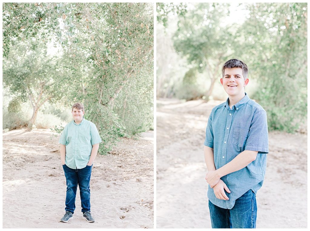 Ison's family photos, two boys standing under big green trees at queen creek wash smiling at camera 
