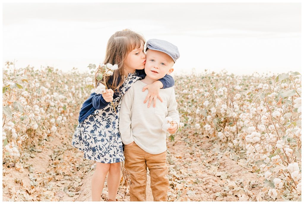 brother and sister standing in a cotton field in Arizona, fall family photos