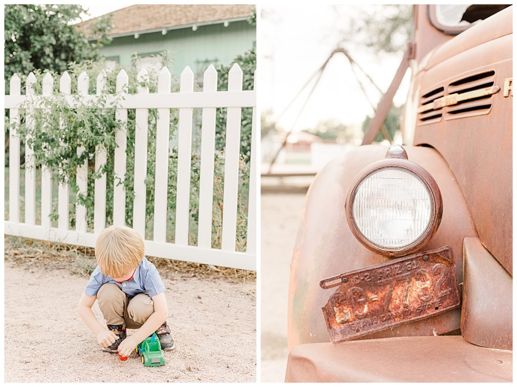 little boy playing with toy truck in front of white picket fence at Tumbleweed Park in Chandler Arizona 
