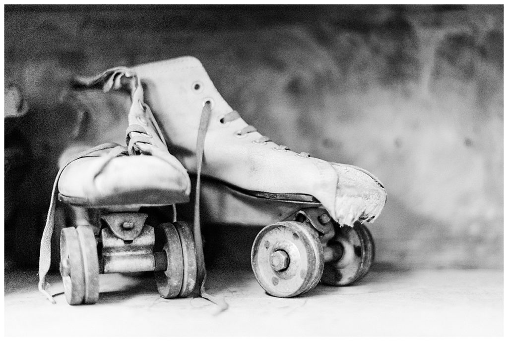 black and white photo of vintage roller blades