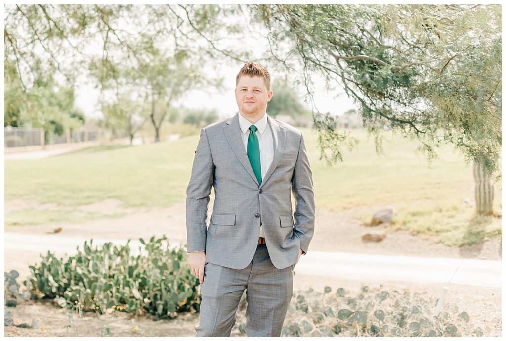 Groom getting ready at the Golf Club at Johnson Ranch 