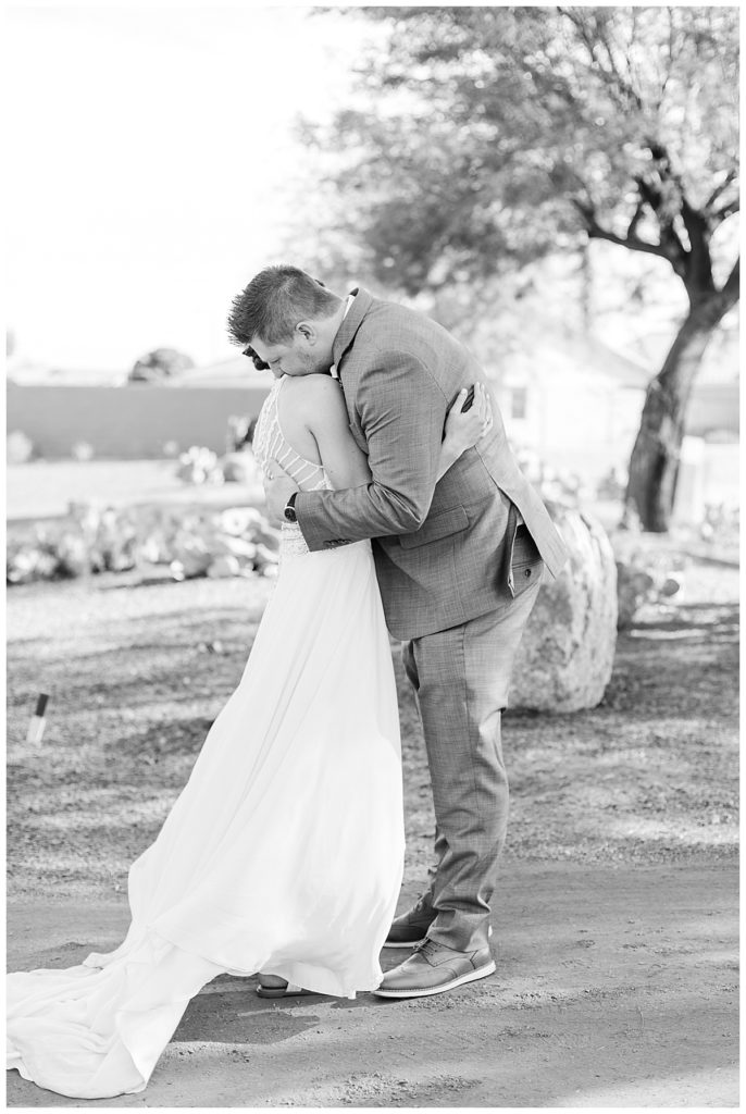 black and white of Natalie & Steven's first look at the Golf Club at Johnson Ranch Wedding