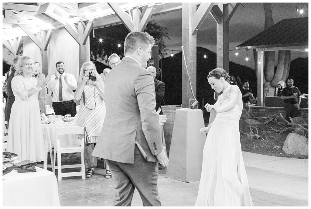 Black and white of Bride and groom dancing during reception at Natalie and Steven's Wedding at the Golf Club at Johnson Ranch Wedding | Gilbert, Arizona