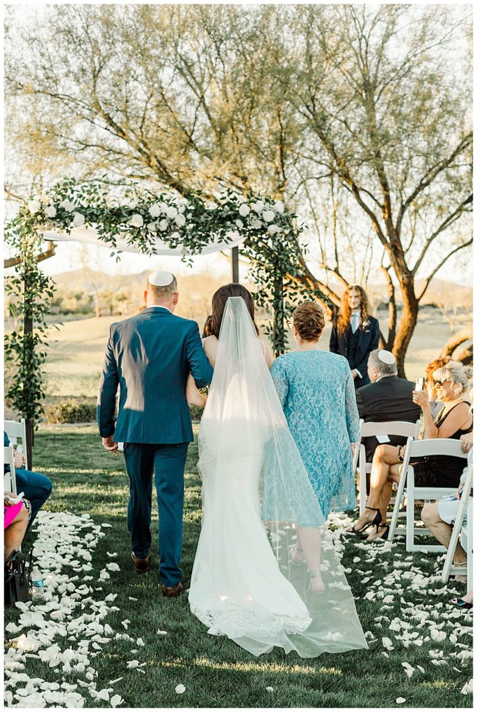 Bride walking down the aisle at the Kiva Club | Blog: 6 Photographer Secrets to a Smooth Running Ceremony 