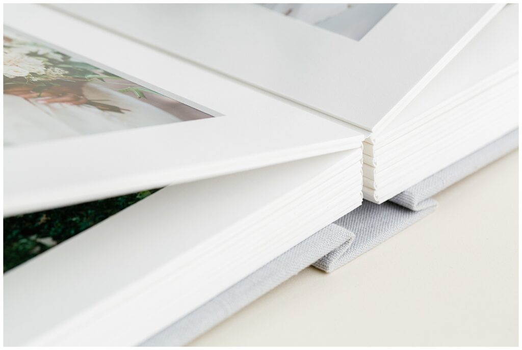 The Impact of Displaying your Family Photos through Artwork - matted album | Bethie Grondin Photography