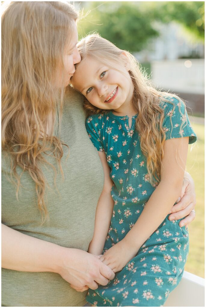 Mom & Daughter, mom kissing little girls forehead| Family Photos 