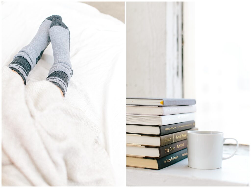 cozy feet in socks and a blanket and a cup of coffee sitting by a stack of books -- how to start taking a Sabbath